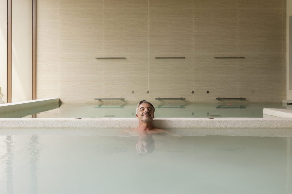 Gentle hydrotherapy pool session at RXV Wellness Village, designed to relieve stress and restore body balance.