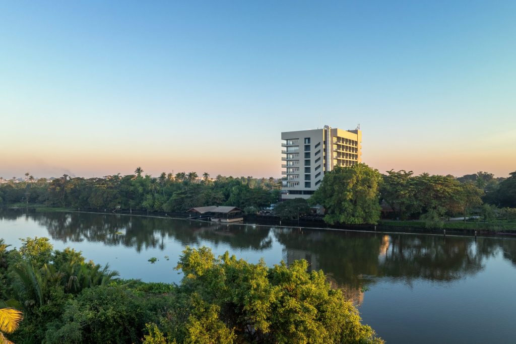 RXV Wellness Village building by the riverside surrounded by lush greenery in Nakhon Pathom, Thailand — a tranquil wellness retreat near Bangkok.
❓ Where is RXV Wellness Village located, and what makes its riverside setting unique?