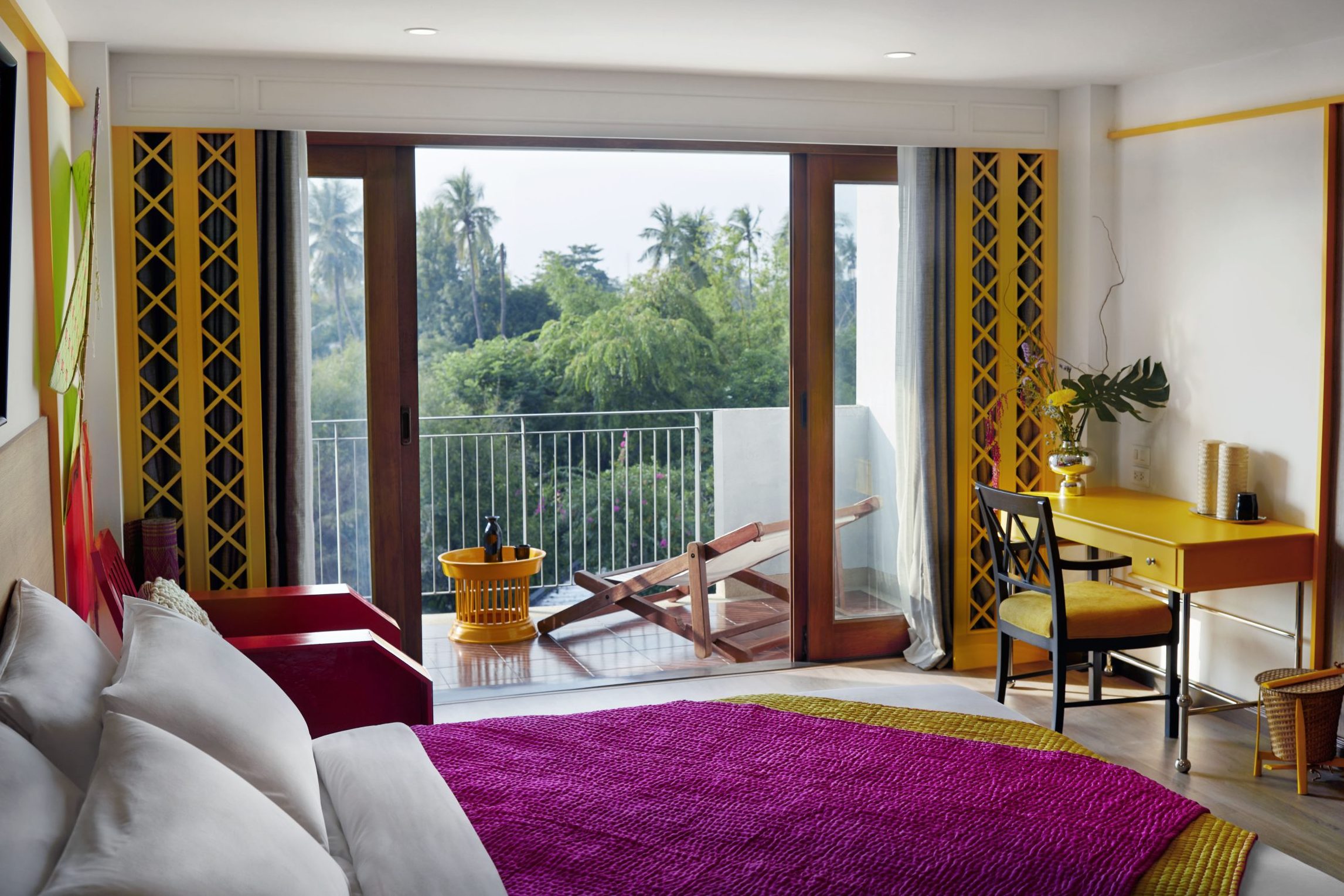 Vibrant wellness suite at RXV Wellness Village with a private balcony overlooking lush greenery.
❓ What makes RXV Wellness Village’s rooms unique for a rejuvenating stay near Bangkok?