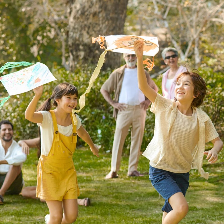 Kids enjoying outdoor wellness activities at RXV Wellness Village, Sampran Nakhon Pathom