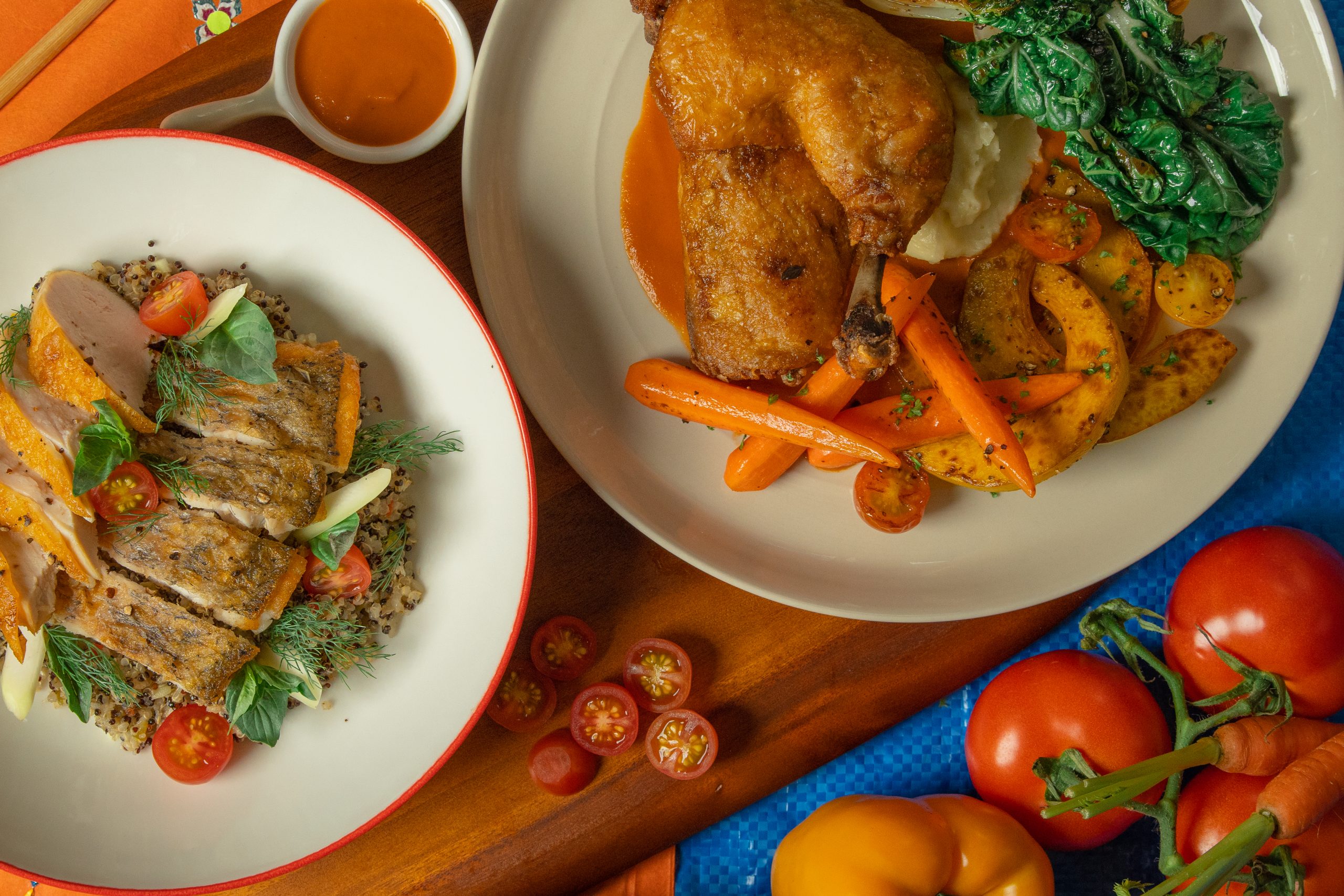 Healthy gourmet dishes with roasted chicken, quinoa, and vegetables served at RXV Wellness Village Sampran.