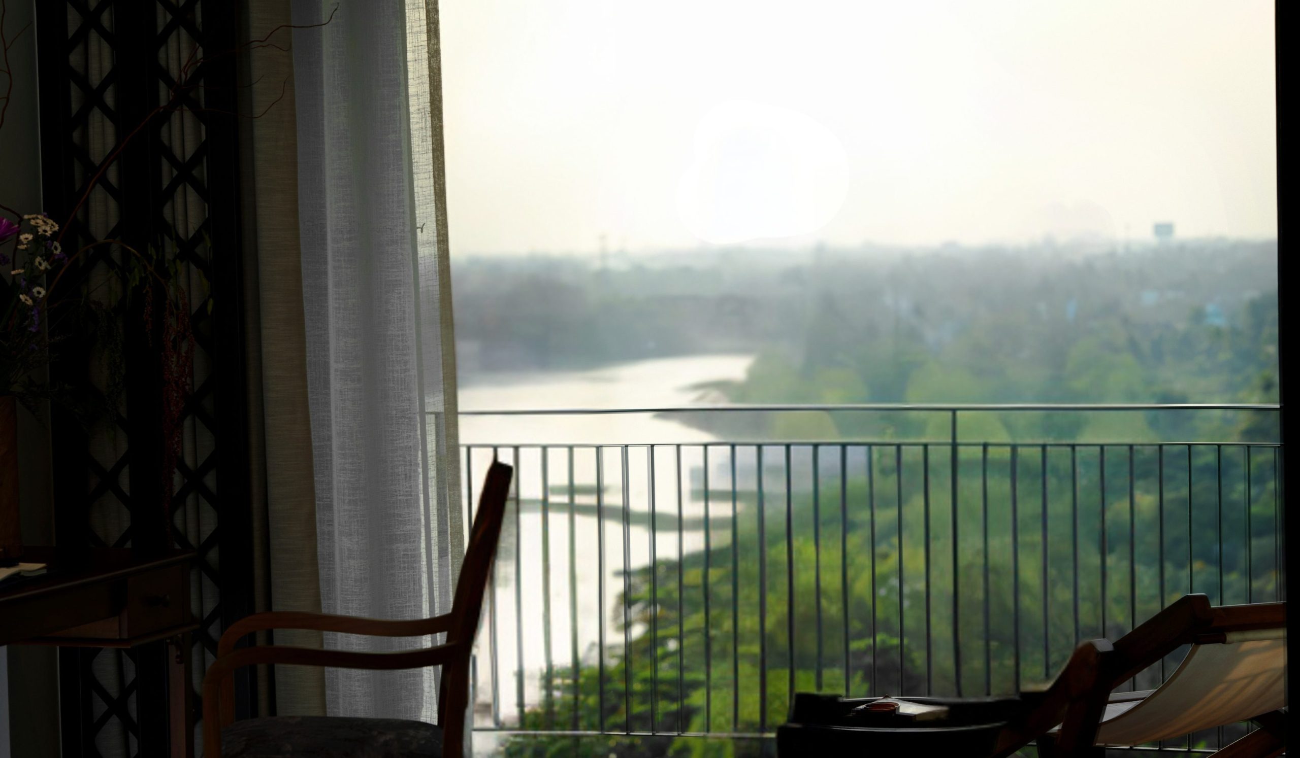 River view from a serene guest room at RXV Wellness Village Sampran.